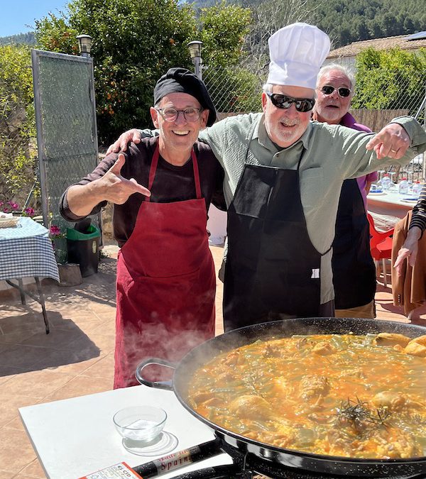 Looks like we did it, Pop. Says one chef to another at the Paella cookout near Valencia
