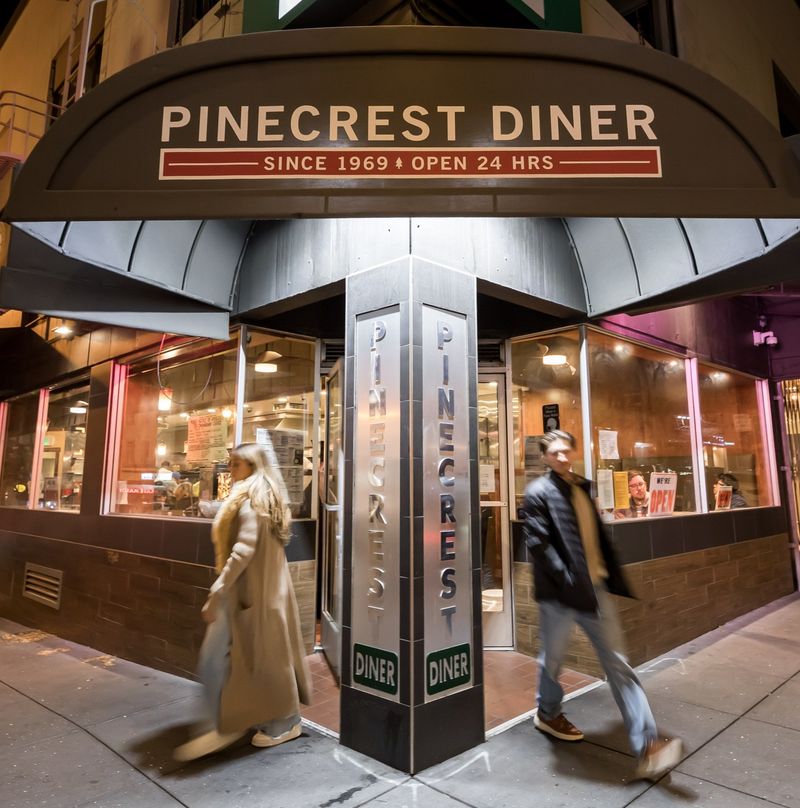 The Green Awning That Glows On Geary