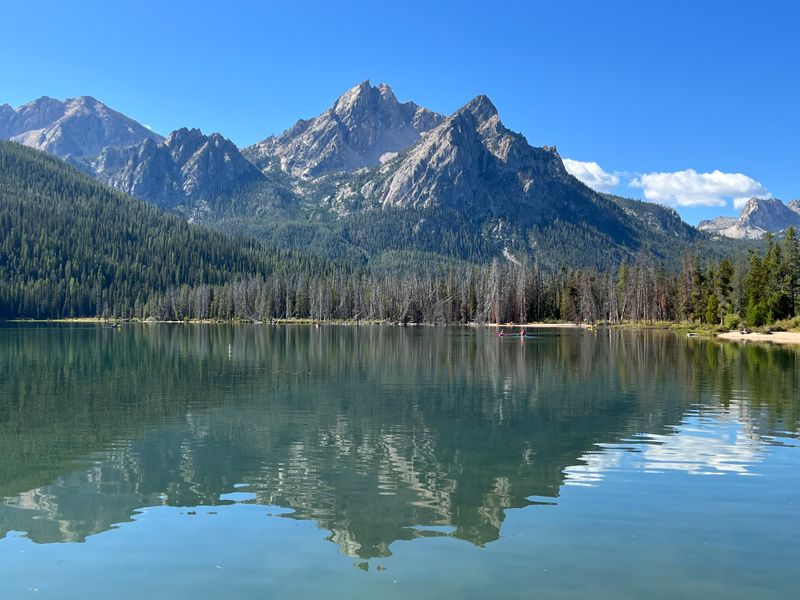The Sawtooth Mountains Rising Like A Frozen-In-Time Backdrop