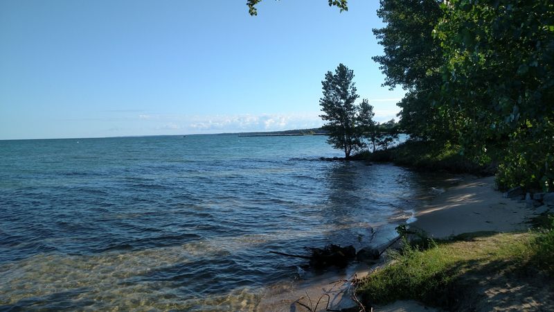 This Small Town Sits Between Two Gorgeous Bodies Of Water: Elk Lake And Grand Traverse Bay