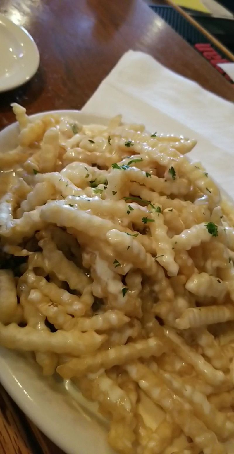 A Mountain Of Fries And Cheese Sauce Became A Statewide Obsession