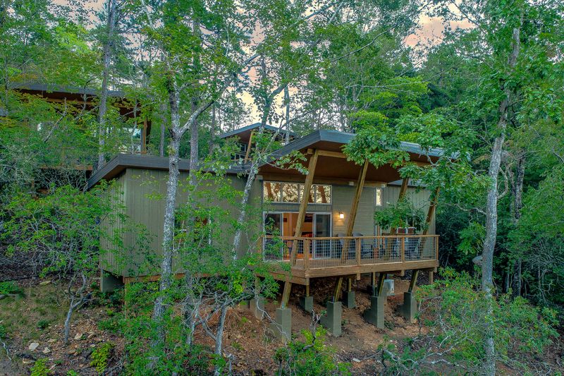 Modern Deck Houses Designed To Blend Seamlessly Into The Woods