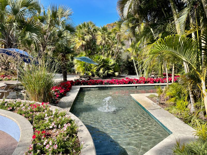 Water Features And Winding Paths Create Fairy Charm