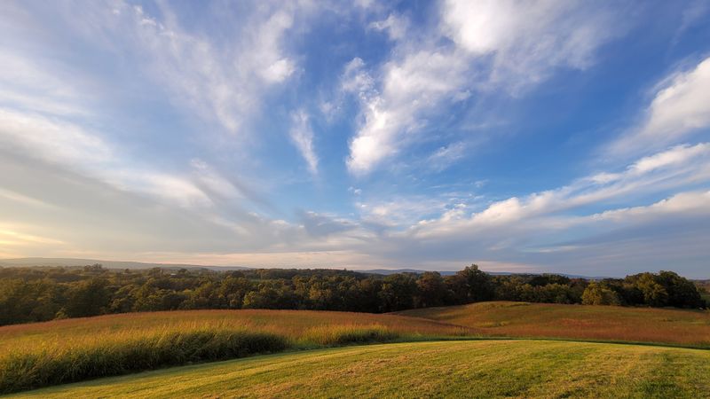 Surrounded By Rolling Hills And Open Countryside