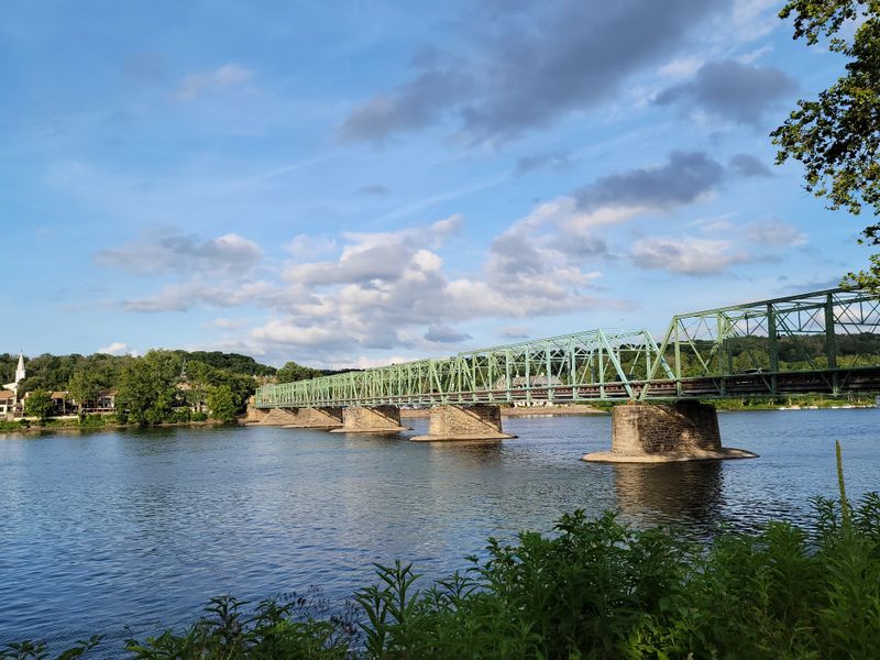 A Riverside Village Many Travelers Pass By