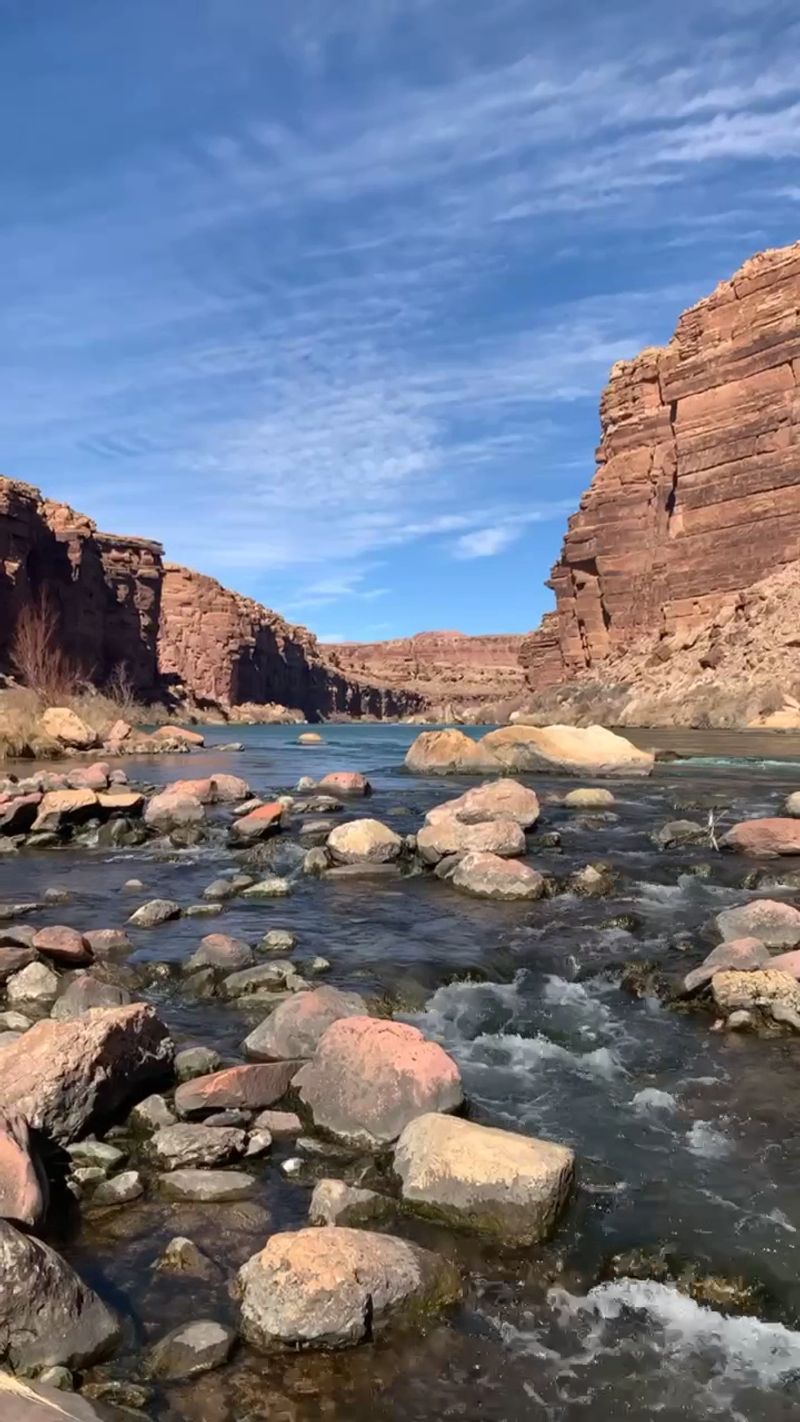 The Quiet Descent From Open Desert Into Canyon Shadows