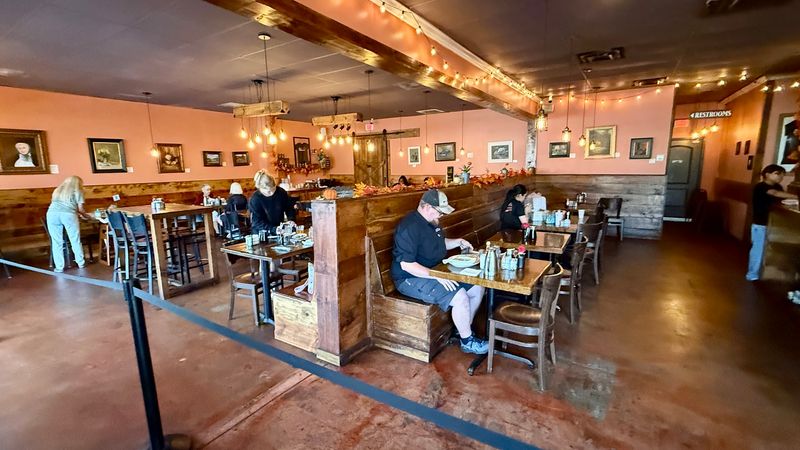 The Atmosphere Inside: Warm Lighting And Local Artwork