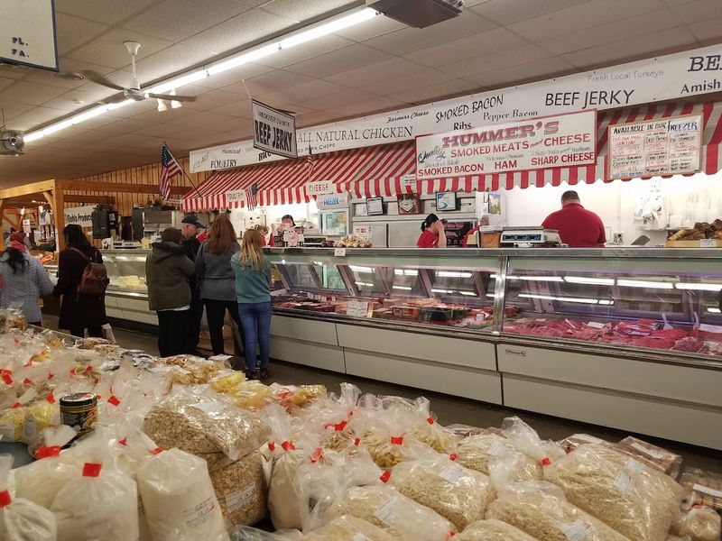 A Butcher Counter Known For Homemade Meats And Smoked Specialties