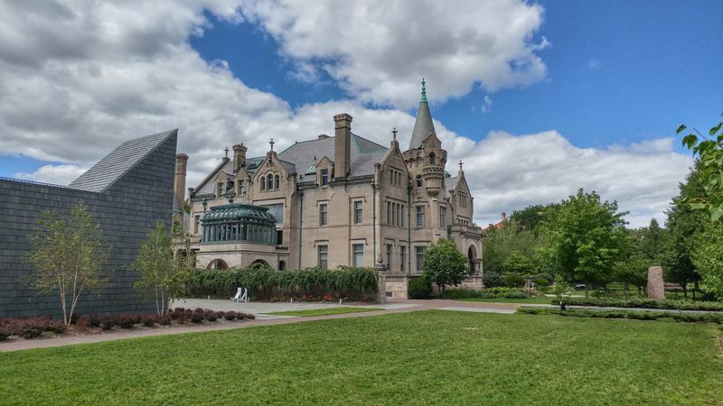 The Exterior Features Turrets, Gargoyles And Ornate Stone Carvings