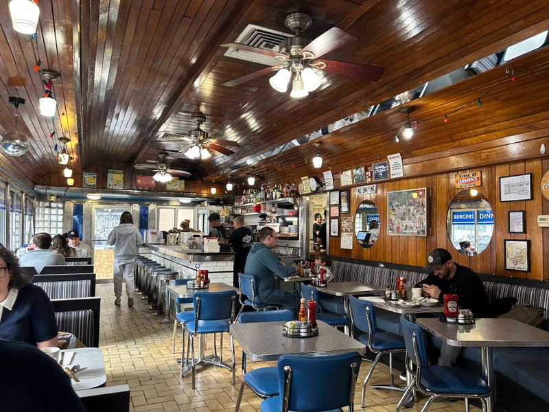 Evenings, A Barstool, And A Neighborhood Glow