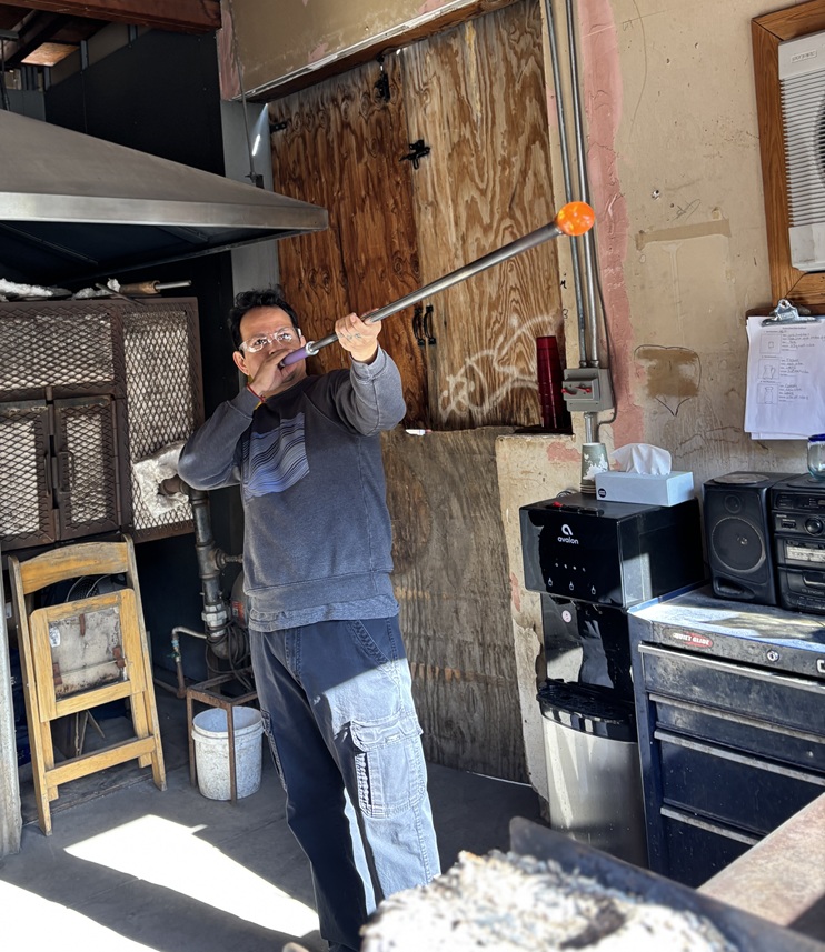 Octavio blowing glass sculptures in Sundance UT