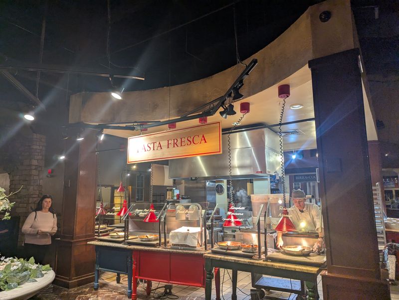 Food Is Prepared At Multiple Live Cooking Stations