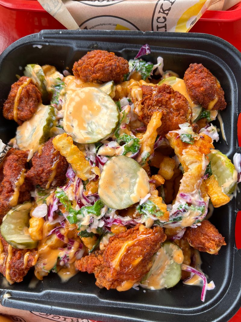 Fries And Slaw Are Designed To Balance The Crunch And Heat