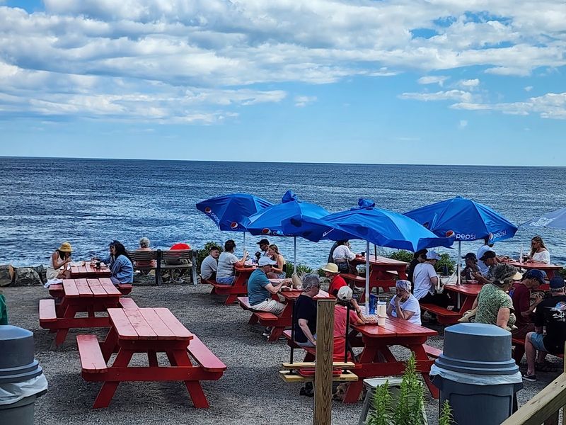 Picnic-Style Outdoor Seating Overlooking The Atlantic