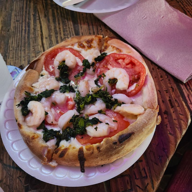 Their Signature Pies Feature Generous Toppings