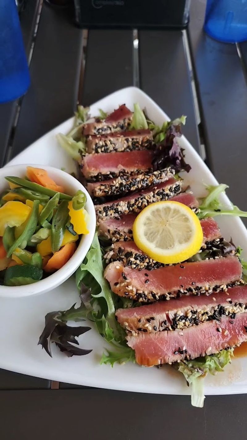 A Menu Featuring Seafood Favorites And Southern Classics