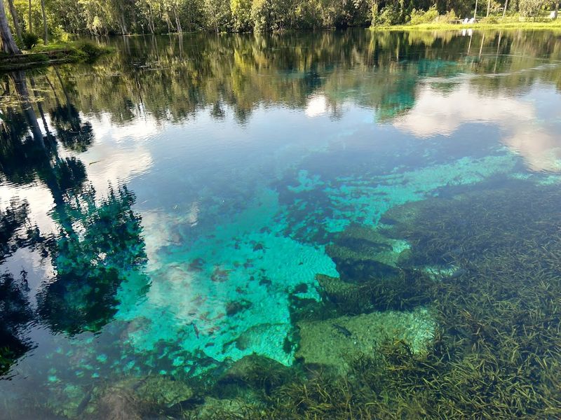 Sunlight Turns The Spring Water A Brilliant Blue