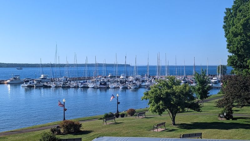 A Waterfront Harbor Filled With Sailboats And Quiet Charm