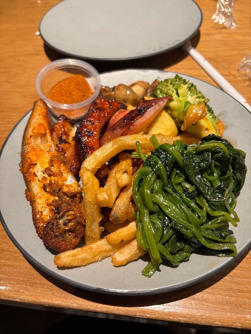 A Live Hibachi Grill Brings Made-To-Order Dishes To Your Plate