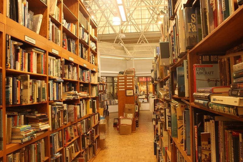 A Labyrinth Of Narrow Aisles And Towering Book Stacks
