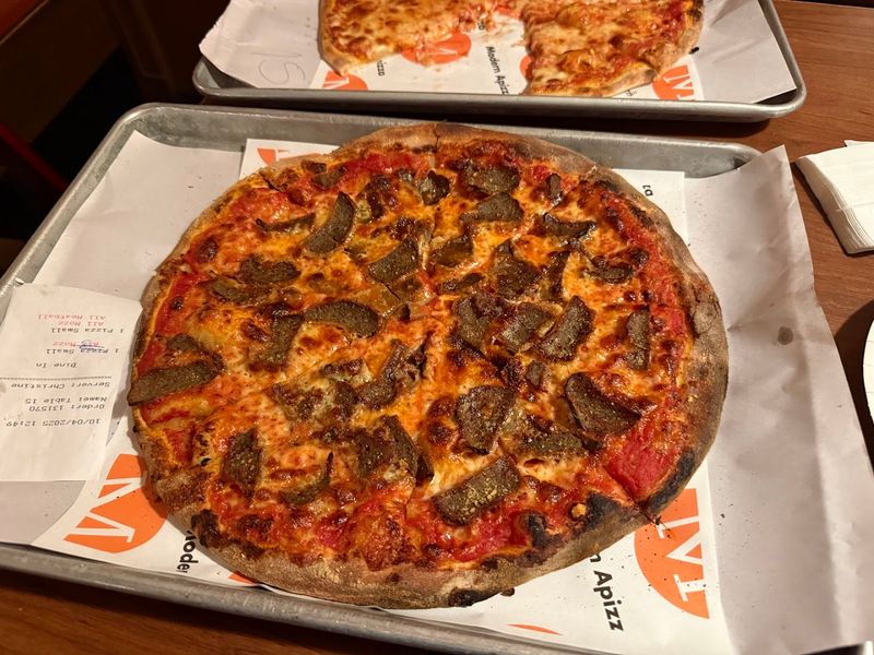 The Brick Oven Here Gives Every Pizza Its Signature Charred Crust