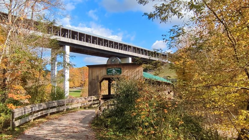 Features A Classic Red Exterior And Wooden Interior