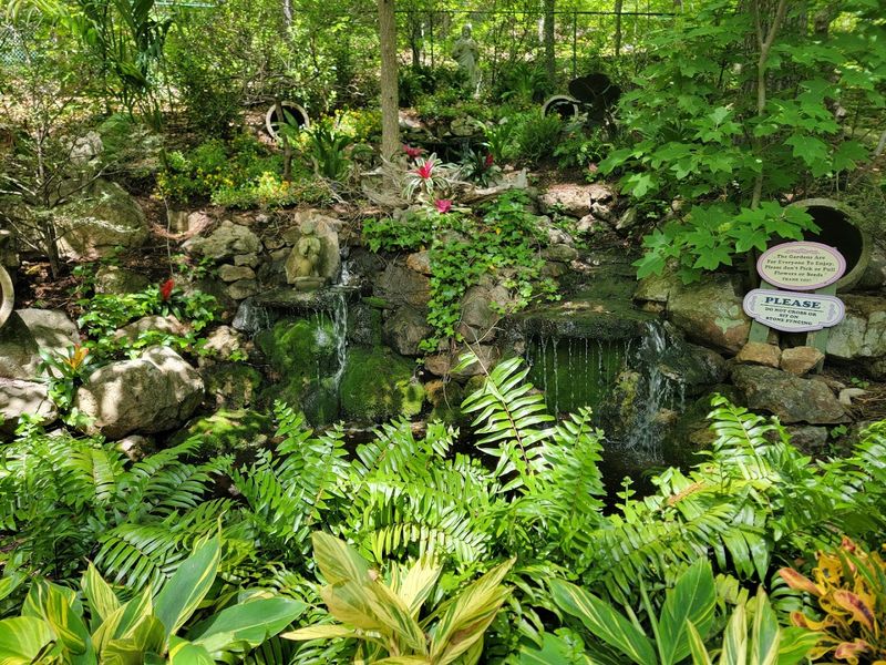 Four Acres Of Tropical Gardens And Winding Pathways