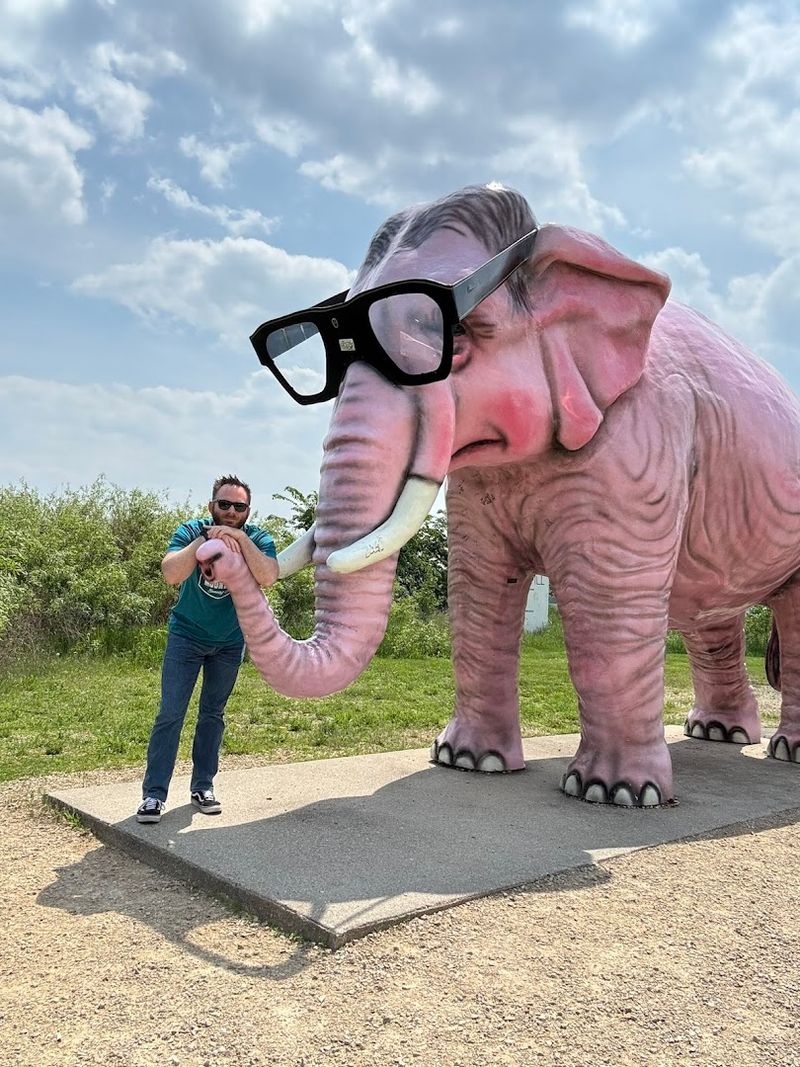 Oversized Glasses Give The Statue Its Signature Look