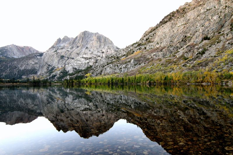 An Alpine Lake Surrounded By Sierra Nevada Peaks