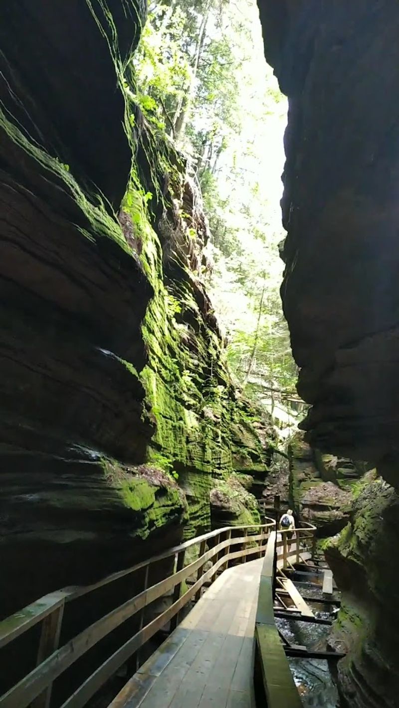 A Narrow Sandstone Canyon Carved By Water
