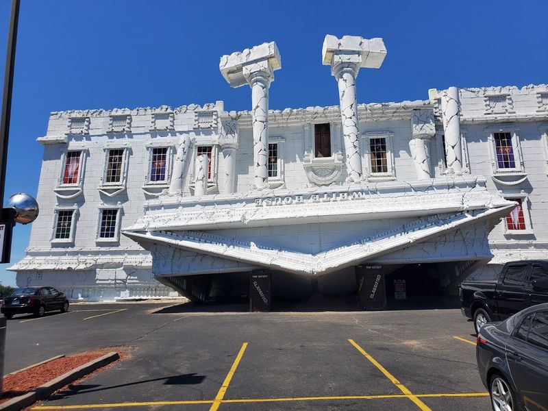 The Giant Upside-Down White House That Stops Drivers In Their Tracks