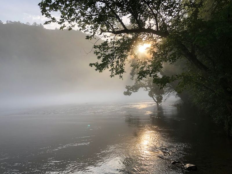 Camping Along The River For An Overnight Stay