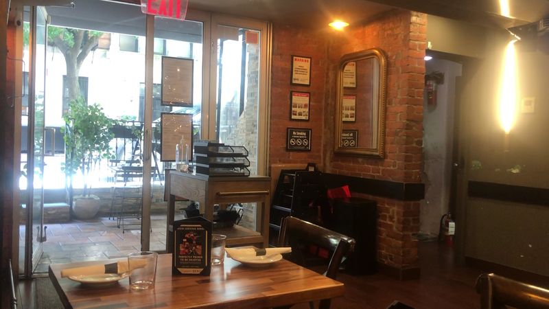 A Brick-Clad Room With A Personality To Match Its Menu