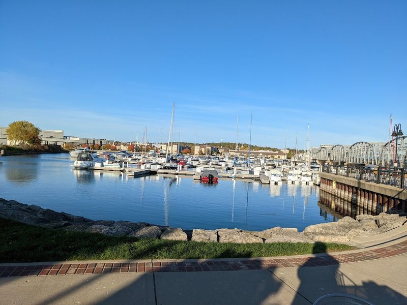 A Scenic Waterfront Where Boats And Sunsets Steal The Show