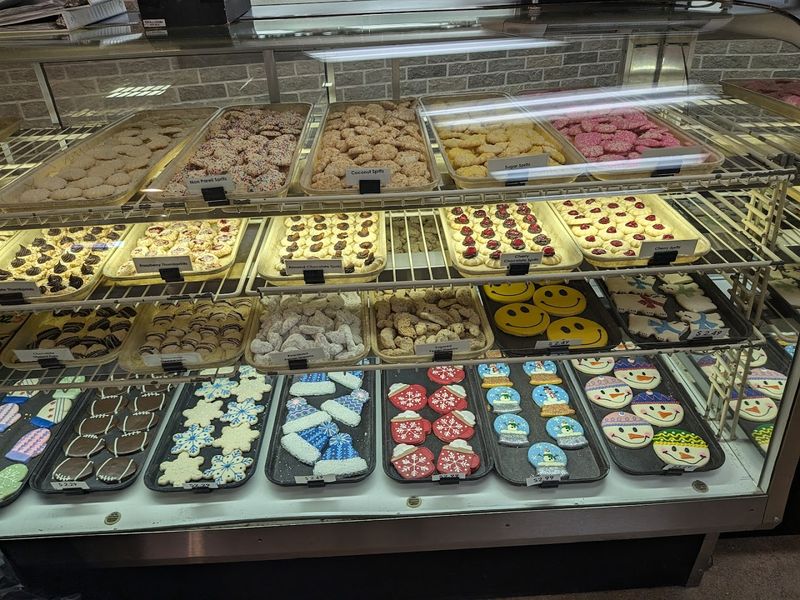 More Than Donuts With Pastries And Cakes Filling The Display Cases