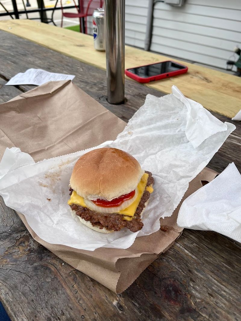 Why The Griddle-Fried Burgers Taste So Different Here