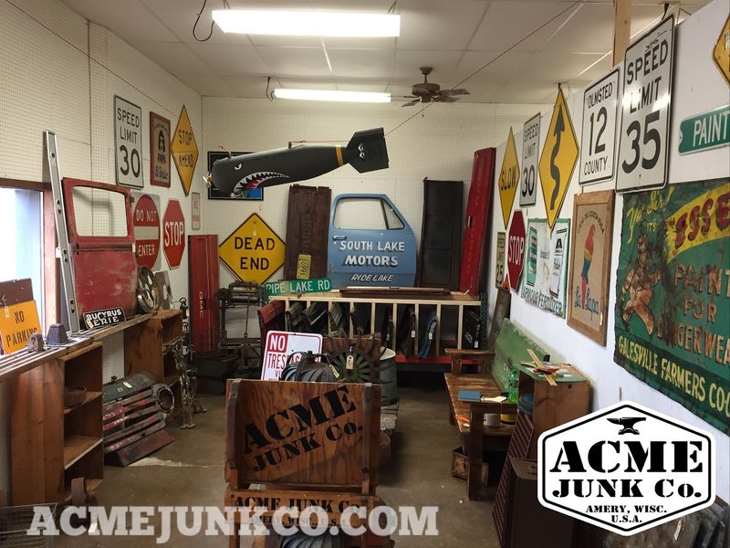 Shelves Packed With Vintage Advertising And Retro Signs