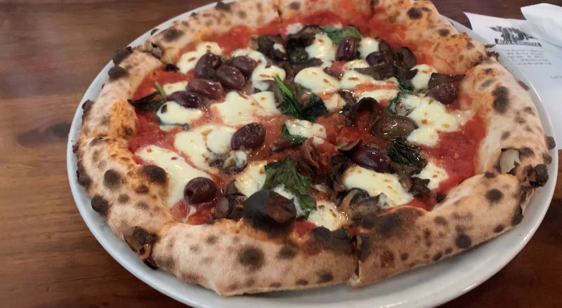 Authentic Neapolitan Pizza Baked In A Wood-Fired Oven
