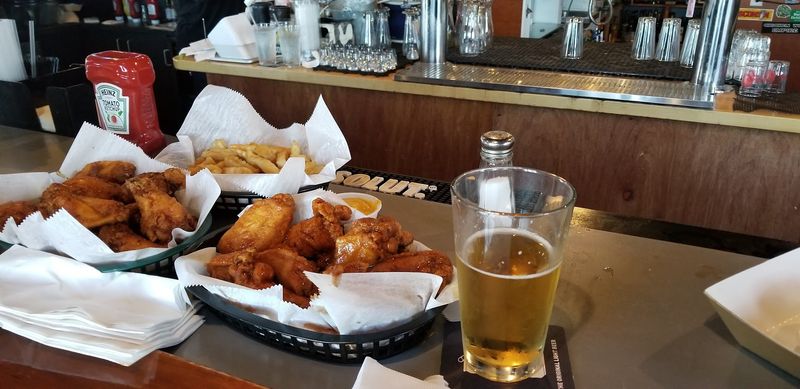 These Wings Are Known For Their Charred, Smoky Finish