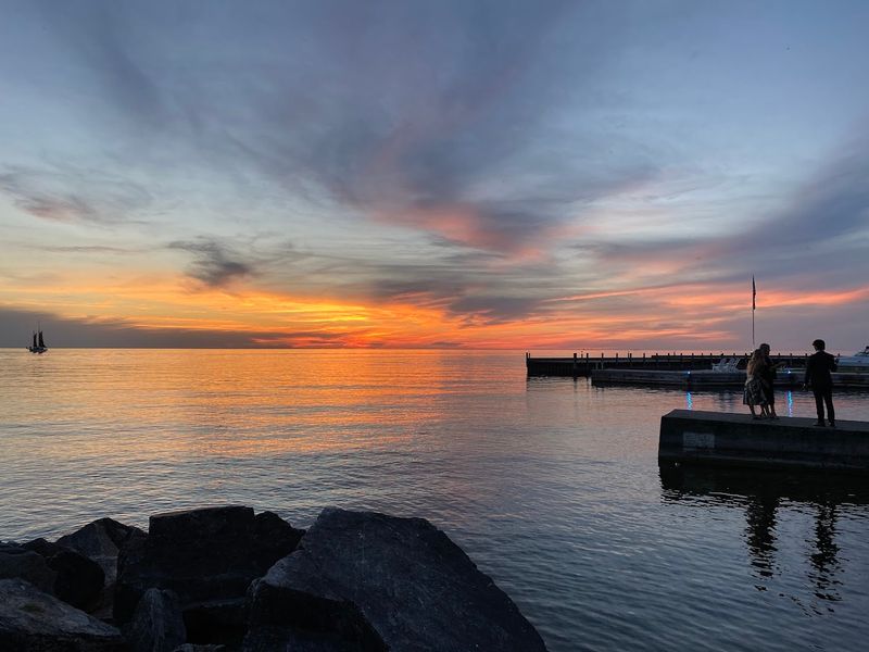 Scenic Sunsets Over Green Bay That Draw Evening Crowds