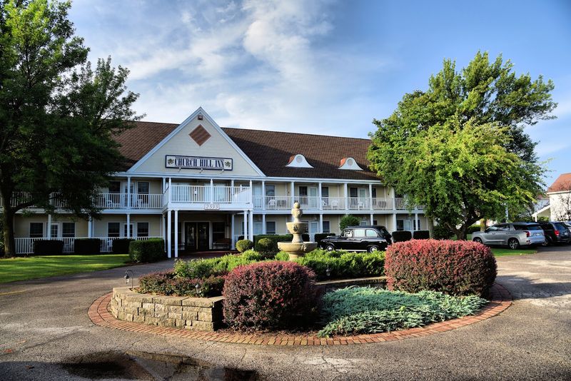 A Walkable Downtown Filled With Small Shops And Cafés