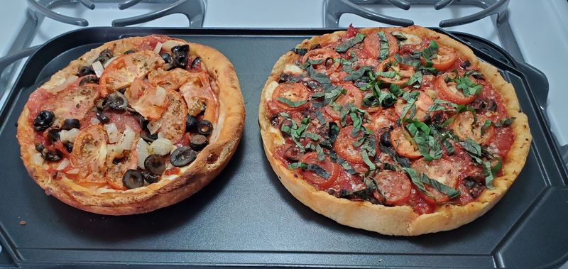 A Thick Buttery Crust With Layers Of Cheese