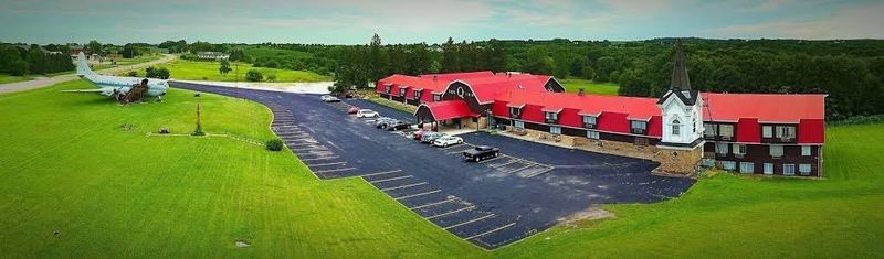 The Boeing C-97 Airplane Parked Right Outside The Hotel