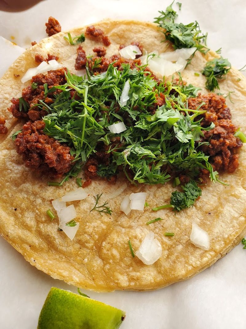 Classic Toppings Like Onion, Cilantro, And Lime Keep Things Authentic