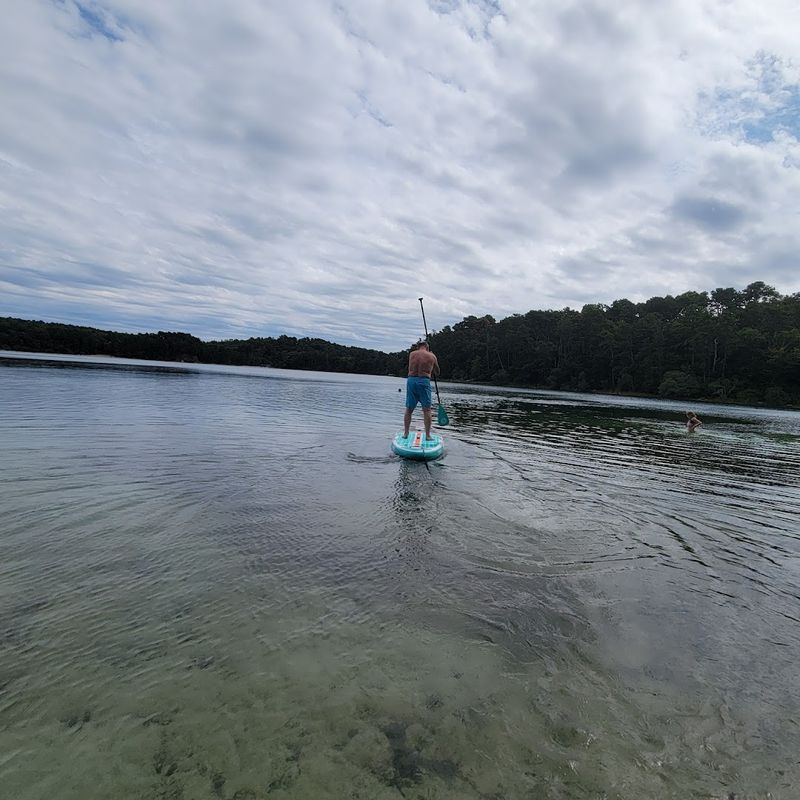 Paddleboarding And Kayaking On Calm Inland Waters