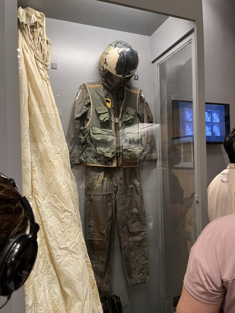 John McCain's parachute and flight suit on display at 'Hanoi Hilton' prison museum