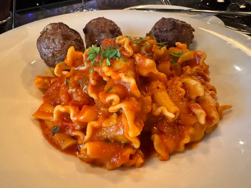 The Menu Features Classic Dishes Like Meatballs, Pasta, And Risotto