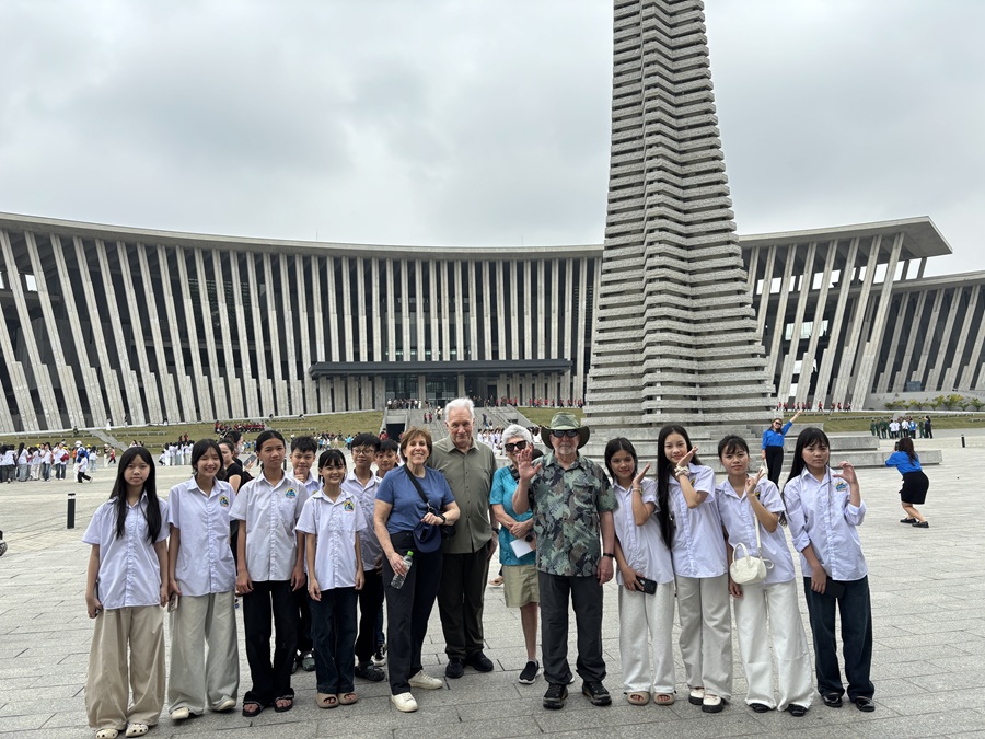 Our group with schoolkids at the Vietnam National History Museumthe Vietnam National History Museum in Hanoi