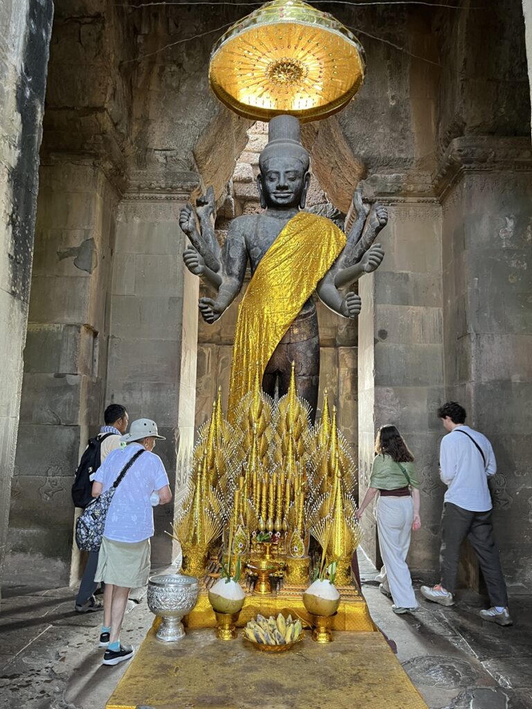 Statue of Hindu god Vishnu inside Angkor