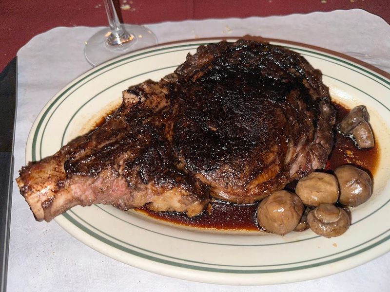 Perfectly Charcoal-Broiled Steaks Are The Real Star Of The Menu